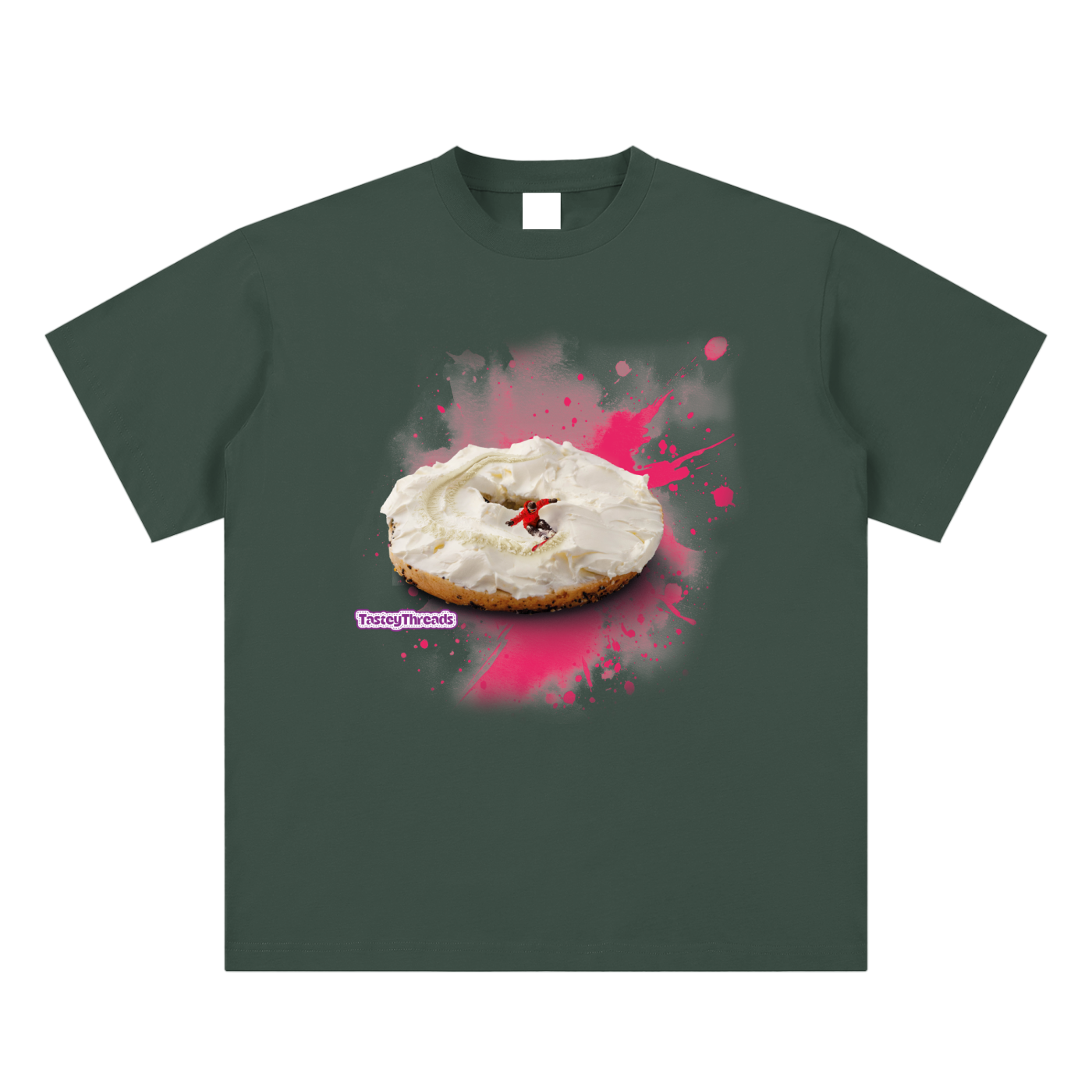 Tastey Threads Backcountry Bagel design, on a dark verde super soft suaded cotton t-shirt, the cream cheese on a bagel doubling as snow for the snowboarder to shred on