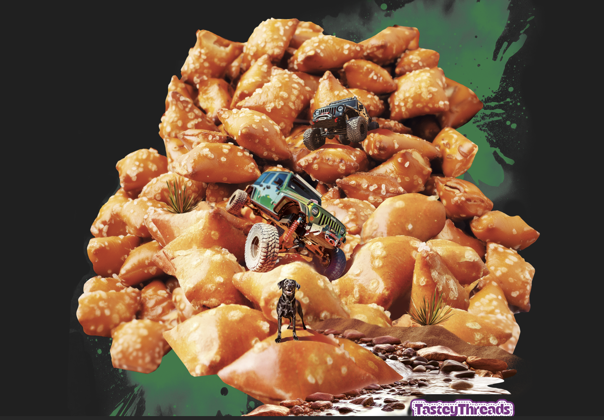 Tastey Threads xtreme rock crawling design it's an ode to the extreme sport of rock crawling but instead of boulders the design includes a rocky pile of pretzel bites on which two extreme jeeps are climbing down and  their faithful black lab is waiting for them at the bottom